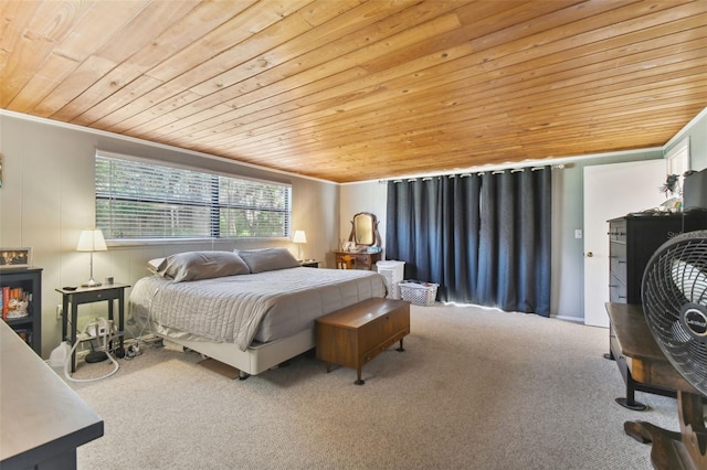 bedroom with carpet, wood ceiling, and ornamental molding