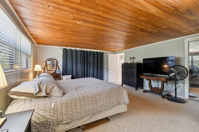 bedroom with multiple windows, carpet floors, and wood ceiling