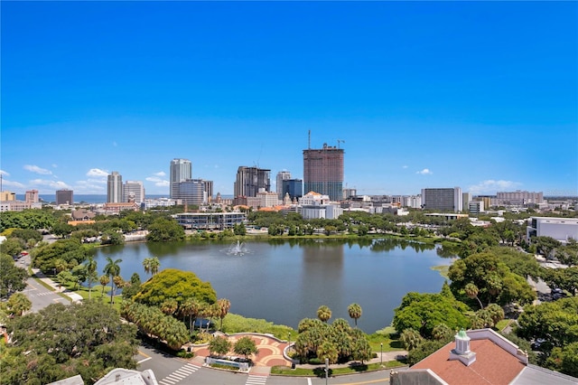 drone / aerial view with a view of city and a water view