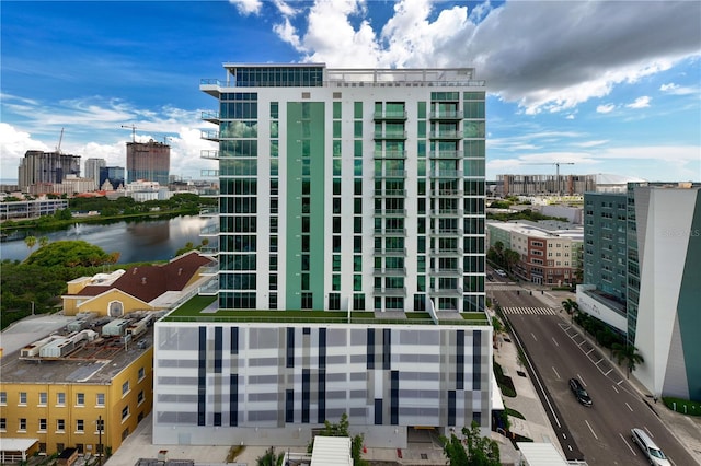 view of building exterior with a water view