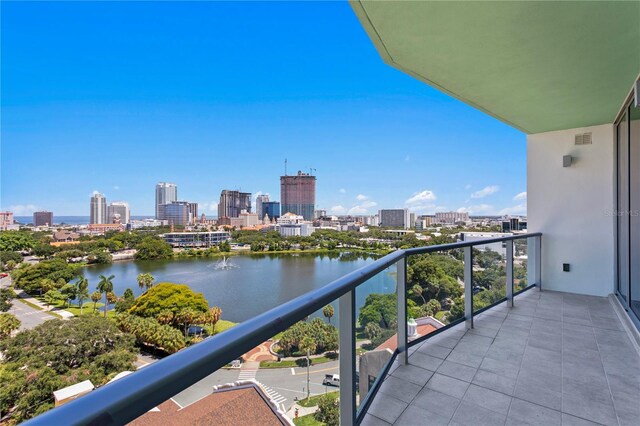 balcony featuring a water view