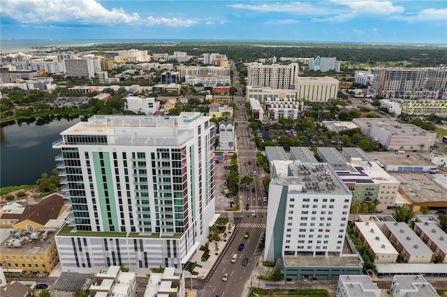 drone / aerial view with a view of city and a water view