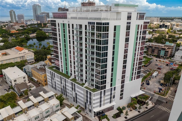 view of property with a view of city and a water view