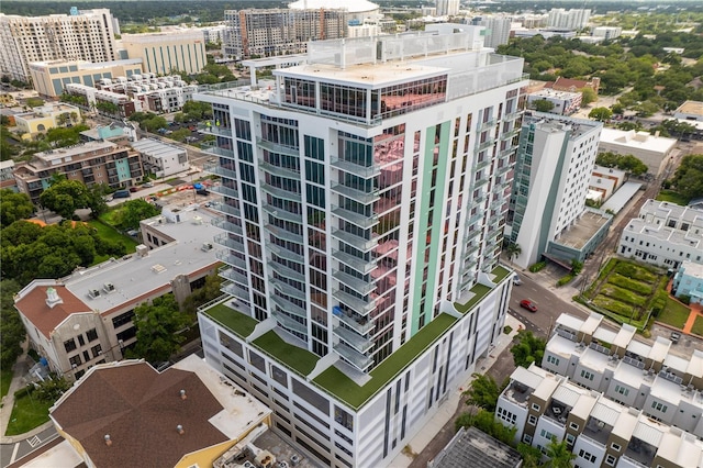 birds eye view of property with a city view