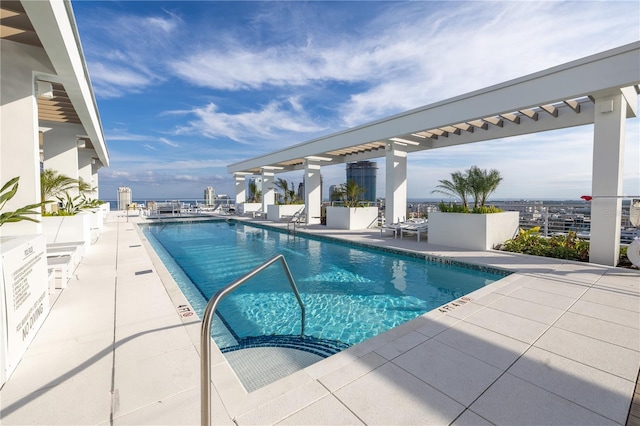 view of pool featuring a patio area