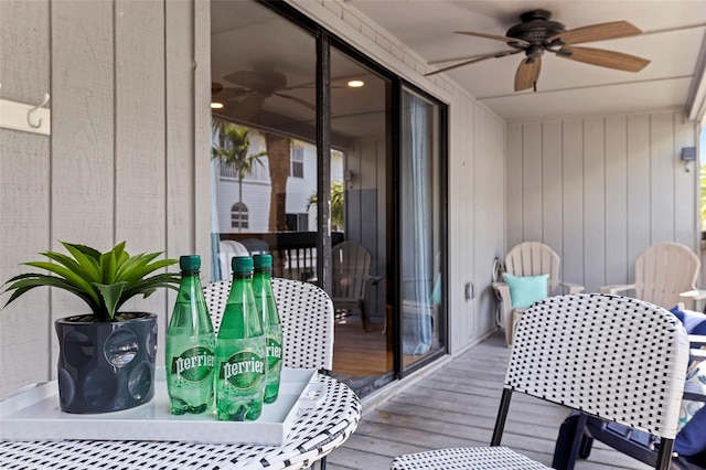 exterior space featuring ceiling fan