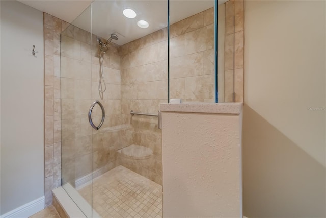 bathroom with an enclosed shower