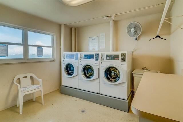 laundry area with washer and clothes dryer