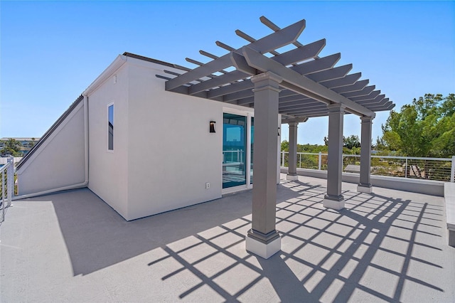 view of patio featuring a pergola