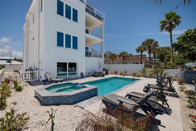 2 4th Ave, Indian Rocks Beach, FL 33785 - view of swimming pool featuring a patio and a pool with connected hot tub