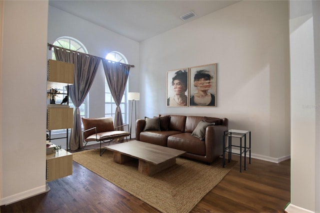 living room with dark wood-type flooring