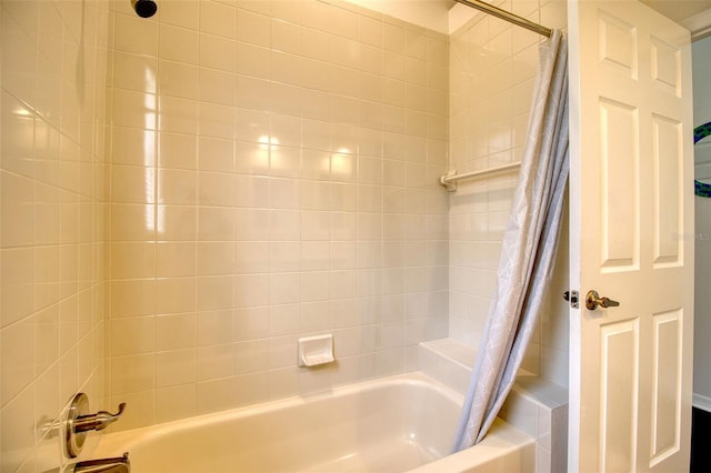 bathroom featuring shower / bath combination with curtain