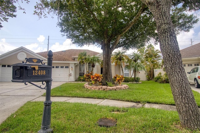 ranch-style house with a front yard and a garage