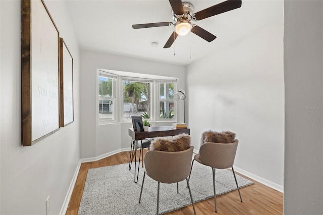 interior space with ceiling fan and light wood-type flooring