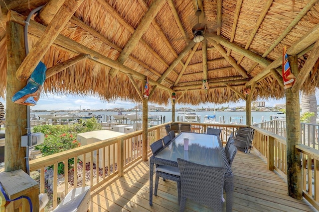 deck featuring a water view and a gazebo