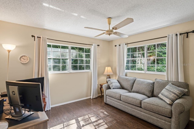 12912 Willoughby Ln, Hudson, FL 34667 - living area featuring a ceiling fan, a textured ceiling, plenty of natural light, and wood finished floors