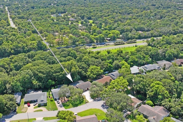 12912 Willoughby Ln, Hudson, FL 34667 - aerial view with a residential view and a wooded view