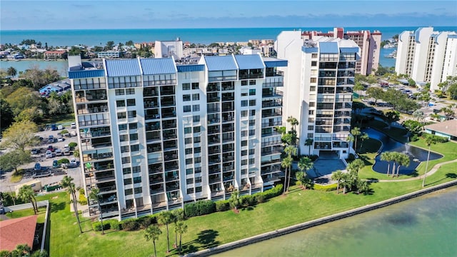 view of building exterior featuring a water view