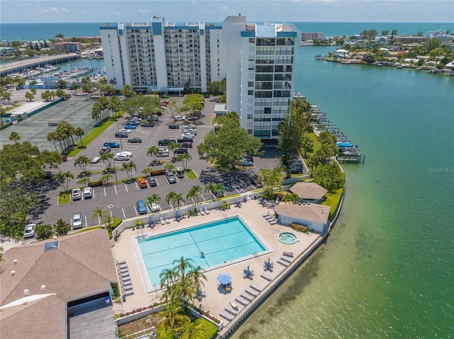 birds eye view of property featuring a water view