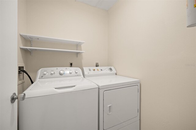 laundry area featuring washer and clothes dryer