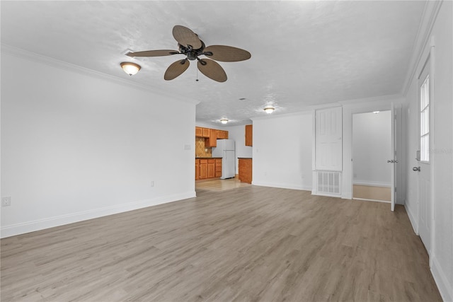 unfurnished living room with ceiling fan, ornamental molding, light hardwood / wood-style floors, and a textured ceiling