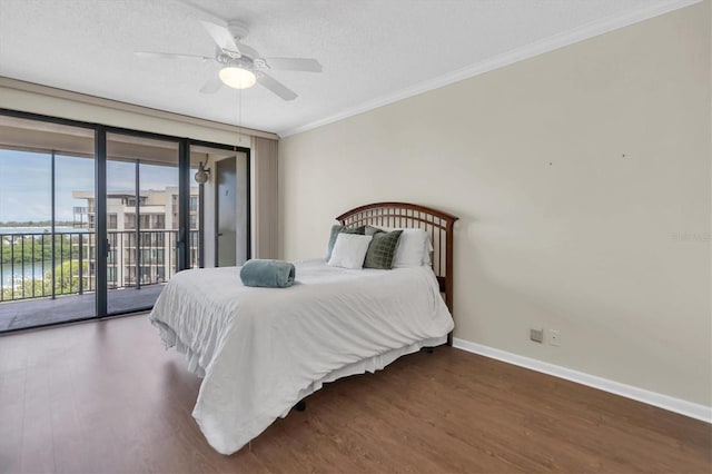 bedroom with hardwood / wood-style flooring, access to outside, a textured ceiling, ceiling fan, and ornamental molding