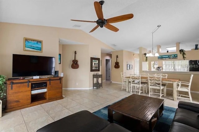 tiled living room with ceiling fan with notable chandelier and lofted ceiling