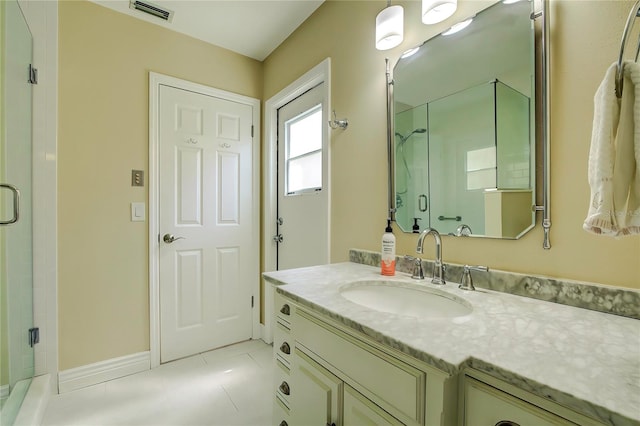 bathroom featuring vanity and tile patterned floors