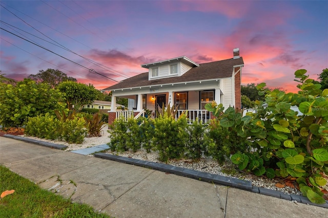 bungalow-style home with a porch