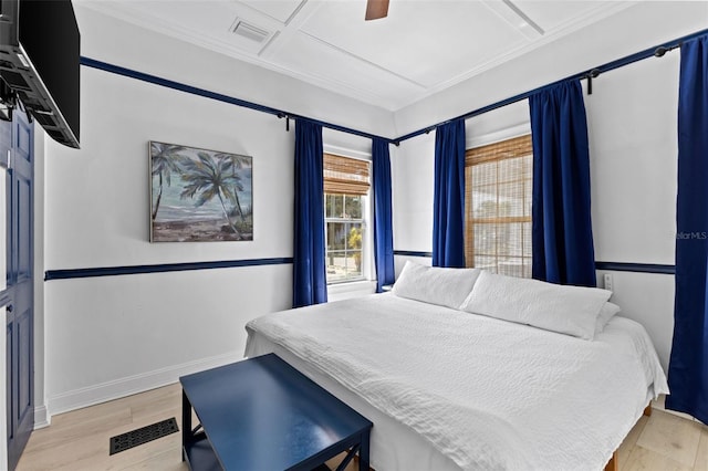 bedroom with ceiling fan and light hardwood / wood-style flooring