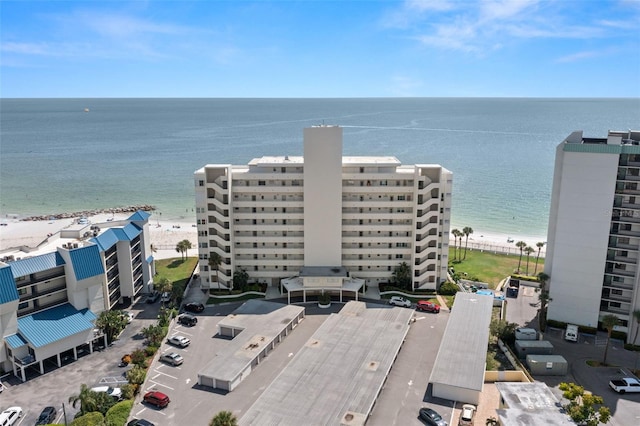 bird's eye view with a water view and a view of the beach