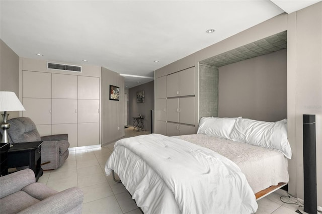 bedroom featuring recessed lighting, visible vents, and light tile patterned flooring