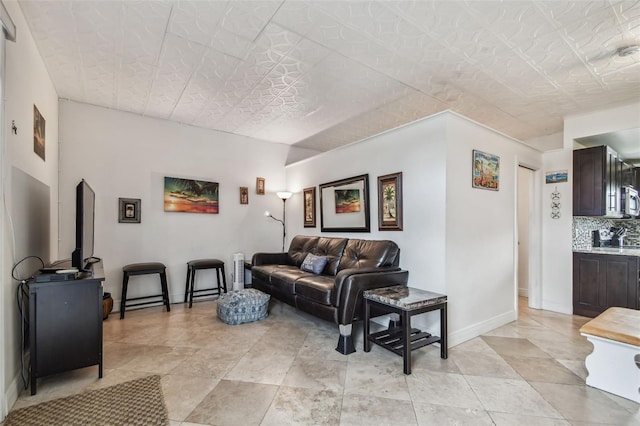 18399 Gulf Blvd Unit 372, Indian Shores, FL 33785 - living room featuring baseboards