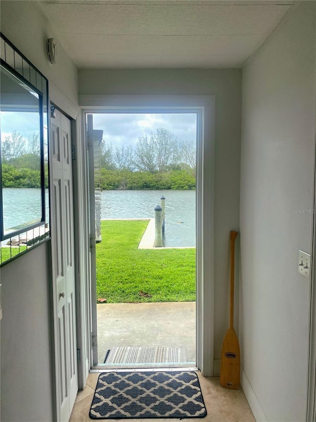 doorway featuring a water view