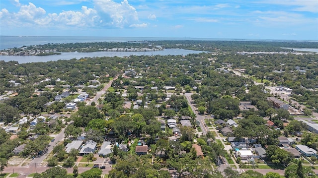 birds eye view of property with a water view and a residential view