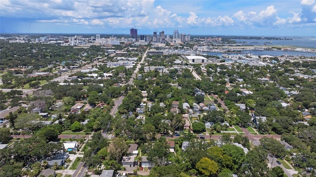 bird's eye view featuring a water view and a city view