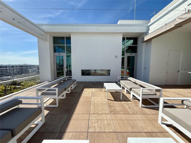 view of patio / terrace featuring an outdoor living space with a fireplace