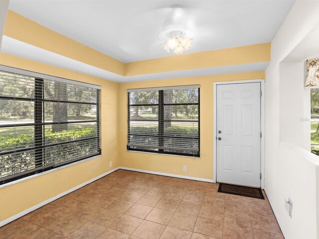 view of tiled foyer entrance