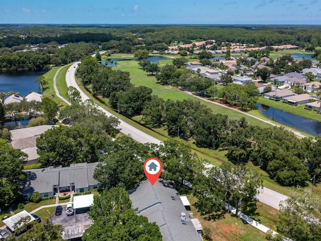 aerial view with a water view and a residential view