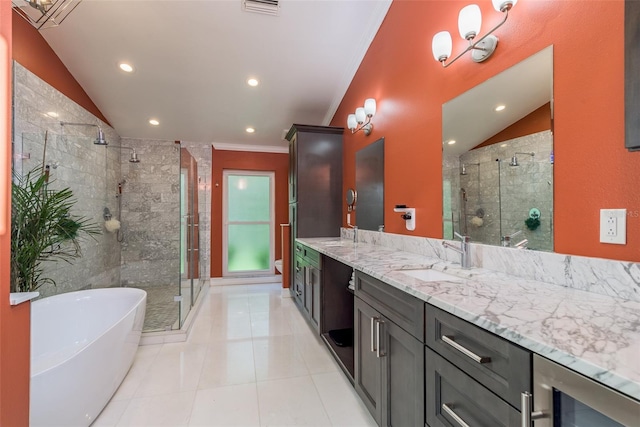 bathroom featuring tile patterned flooring, crown molding, plus walk in shower, double sink vanity, and beverage cooler