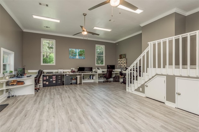 interior space with ceiling fan, light hardwood / wood-style flooring, and crown molding