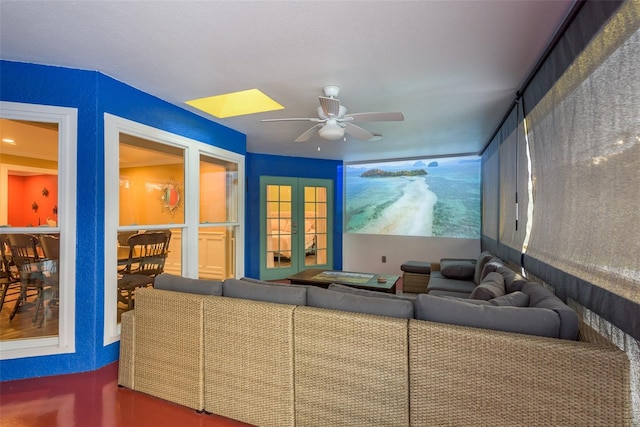 interior space featuring ceiling fan and french doors