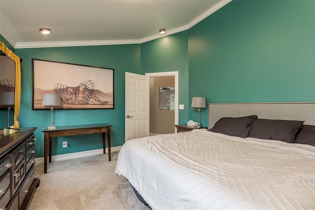 carpeted bedroom featuring crown molding