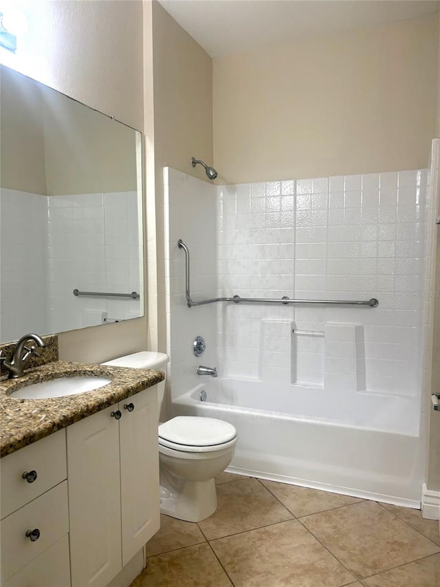 full bathroom with vanity, tub / shower combination, tile patterned floors, and toilet