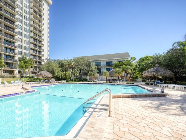 view of swimming pool with a gazebo and a patio