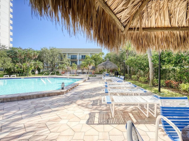 view of pool featuring a gazebo and a patio area