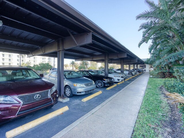 view of parking with a carport