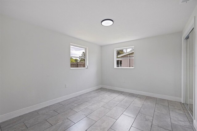 view of tiled empty room