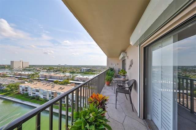 balcony featuring a water view