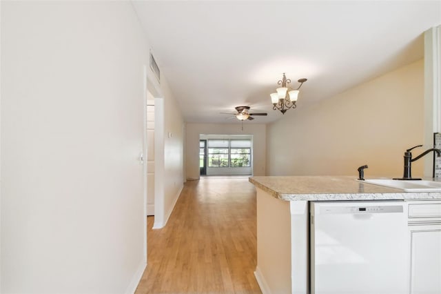 kitchen featuring light hardwood / wood-style floors, sink, white dishwasher, and ceiling fan with notable chandelier